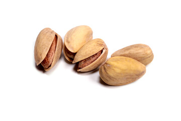Shelled pistachios isolated on white background macro