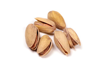 Shelled pistachios isolated on white background macro