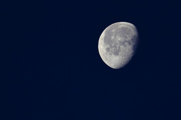 Waning Gibbous Moon in thew night sky. 