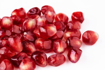 pomegranate seeds close-up on a light background