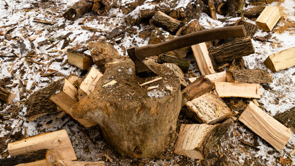 Firewood for the oven. Wood preparation. Chopping wood. Household. Cutting with an axe.