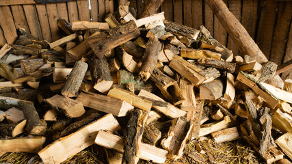 Firewood for the oven. Wood preparation. Chopping wood. Household. Cutting with an axe.
