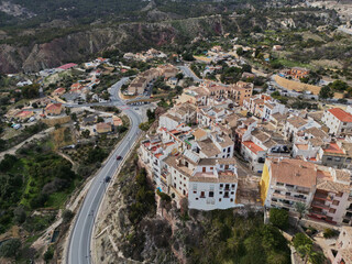 Fototapeta na wymiar Top view of the Spanish city of Finestrat.Drone photo.Сity of Finestrat and the Puig Campana mountain.Costa Blanca,Spain 