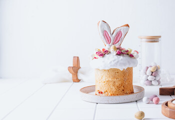 Easter Panettone with bunny ears cookies, mini chocolate eggs, marshmallows and dry roses.