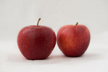 Two red Royal Gala Apple, isolated on white baclground