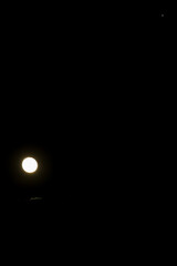 Full moon in the black night sky