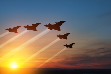 Air Force Day. Aircraft silhouettes on background of sunset or sunrise.