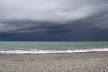 Thundercloud over a stormy sea