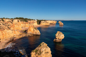 Fototapeta na wymiar Landscape of the rocky beach in Algavre area - Portugal