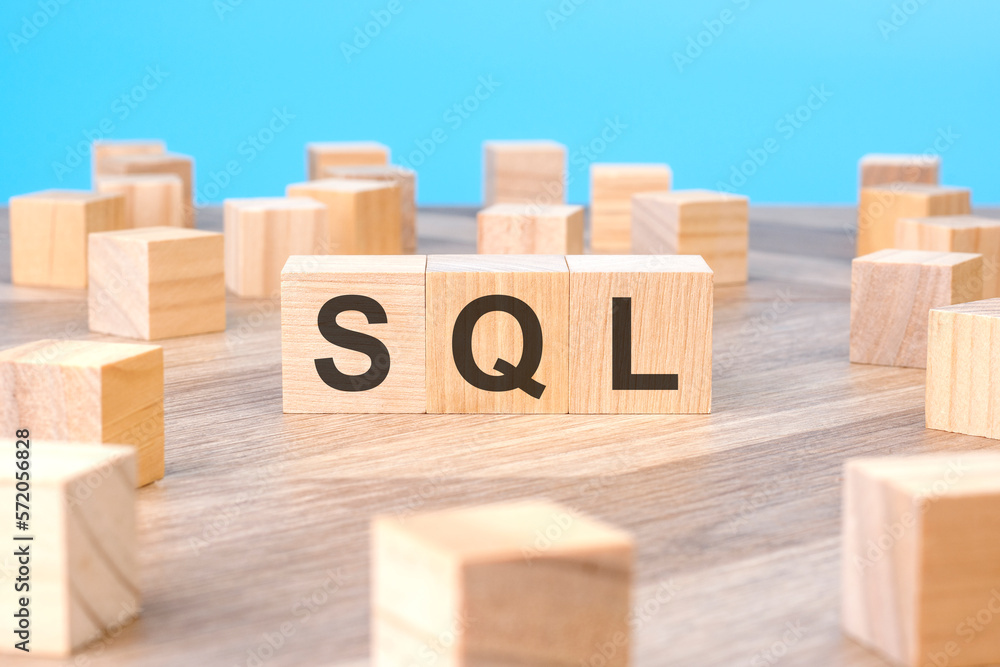Poster sql text as symbol on cube wooden blocks.