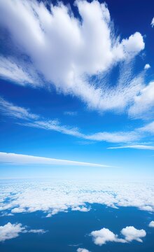 Majestic Clouds and Blue Sky Above, Suitable for Backdrop, Wallpaper, Background. Generative AI © dreambender