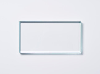 Glass square shapes on a light background.