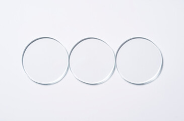 Glass round shapes on a light background.