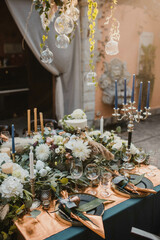 Rustic decoration with flowers and candles. 