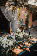 Rustic decoration with flowers and candles. 