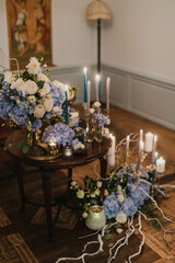 Rustic decoration with flowers and candles. 