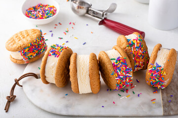 Ice cream sandwiches with vanilla ice cream and peanut butter cookies