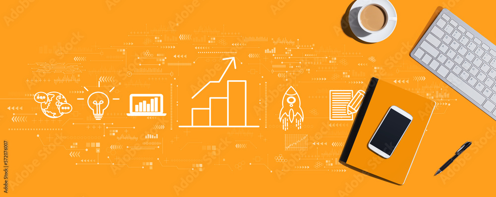 Poster business growth analysis with a computer keyboard and office items