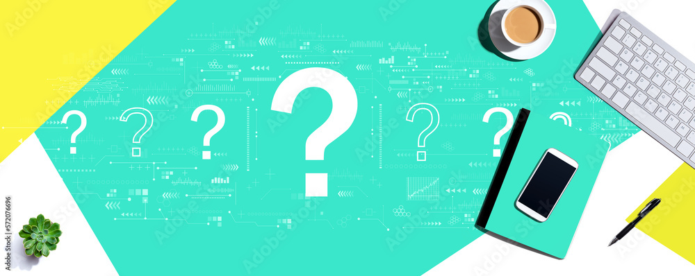Poster question marks with a computer keyboard and office items
