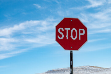 stop sign on blue sky