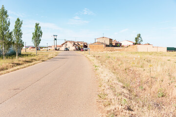 Obraz premium Camino Frances (French Way) - paved road entering Villamarco, province of León, Castile and Leon, Spain - June 2022