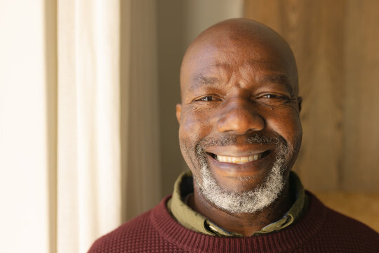 Portrait of african american senior man smiling at home