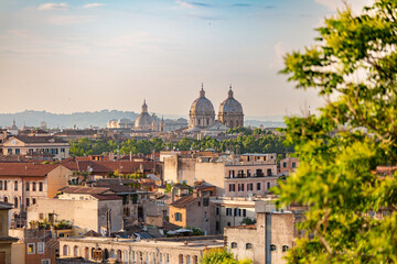 Fototapeta na wymiar Rome, Italy .Beautiful view at the Rome and Tiberis river.Panoramic view of the city from the Orange Garden. Architecture and landmarks. Old famous streets, attractions and world heritage.