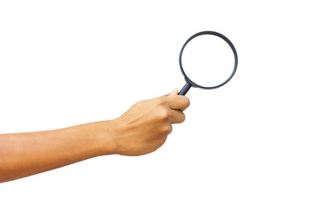 A man's hand holds a magnifying glass