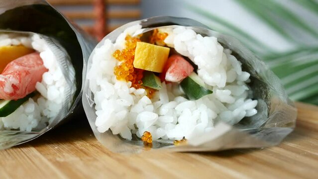 maki Sushi on plate with chopstick on table