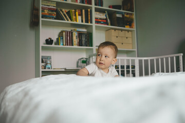 baby climbs out of bed