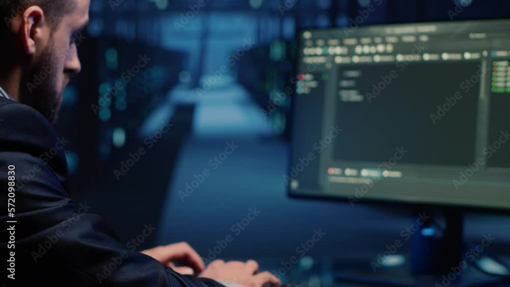 Poster database admin checking mainframe system on computer in data center, working with security protectio