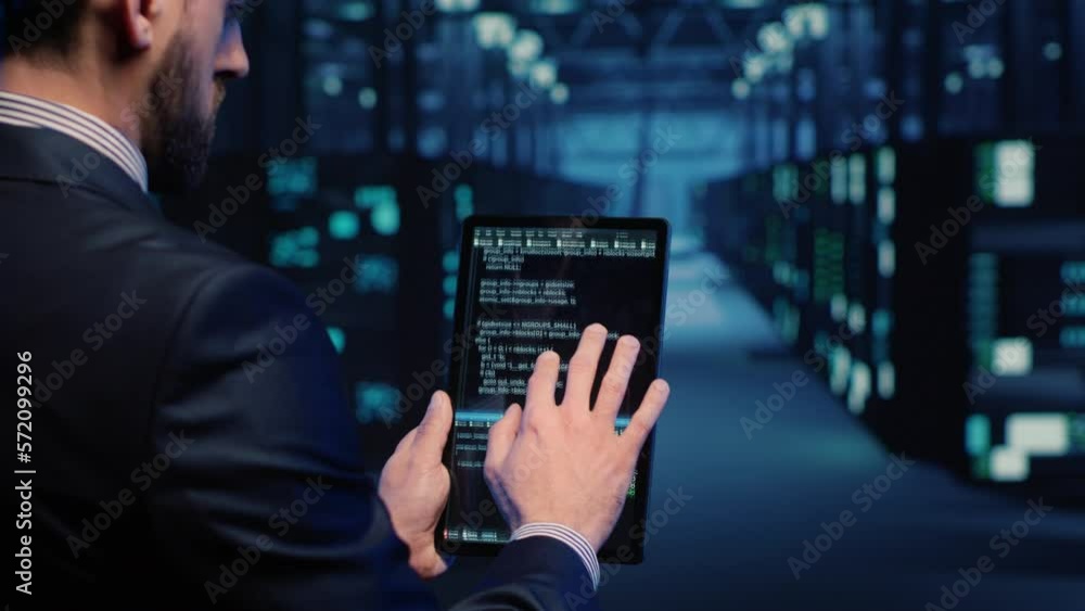 Poster support specialist checking server computers on tablet, planning mainframe system backup in server r