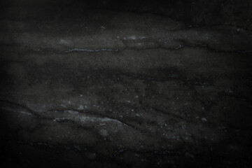 Texture of black marble surface as background, closeup
