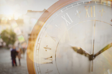 Time related concepts. People walking in city and clock, blurred view. Double exposure