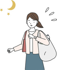 仕事帰りに買い物をして急いで帰宅する女性