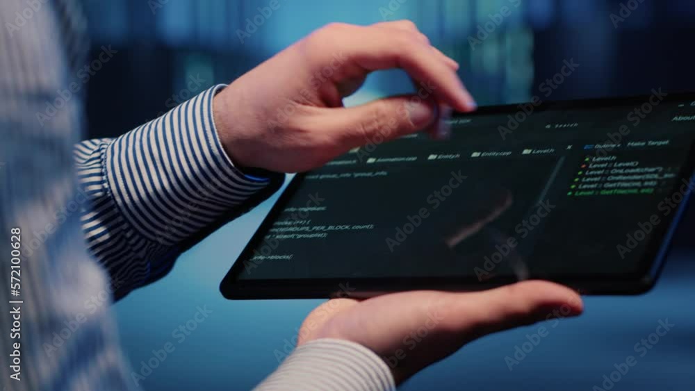 Poster male database technician looking at hosting server on tablet, working on cyberspace networking. infr