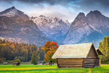 Bavarian alps and rustic farm barn, Garmisch, Zugspitze massif, Bavaria, Germany