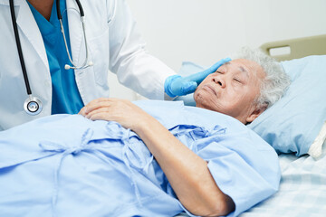 Doctor holding hands Asian elderly woman patient, help and care in hospital.