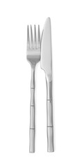 Knife and fork isolated on white, top view. Stylish shiny cutlery set