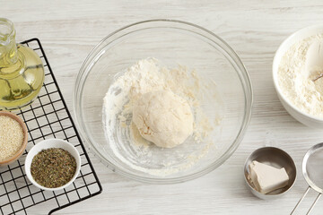 Cooking grissini. Different ingredients on white wooden table, flat lay