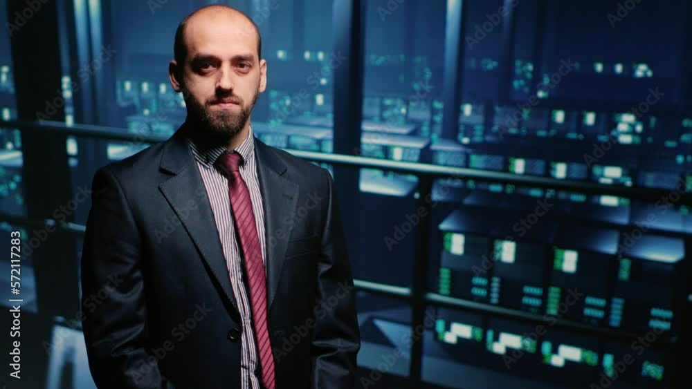 Poster it engineer standing beside server racks cabinets, checking diagnostics on computer mainframe. syste