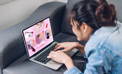 Portrait of woman relax use technology of laptop computer for fashion online shopping.Young girl...