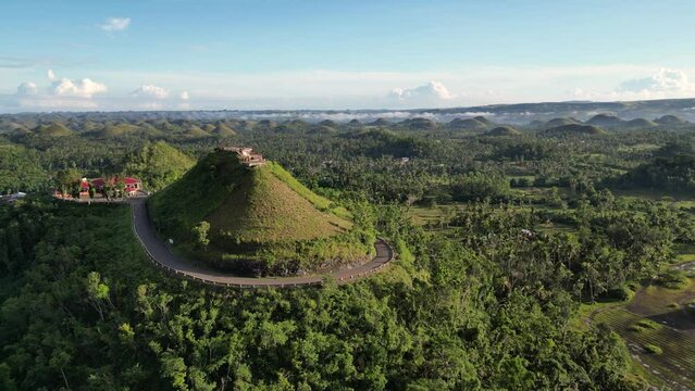 Unusual place on island of Bohol. Philippine Chocolate Hills still look quite green in summer. On one of hills there is observation deck, from which expanses of this place look even more picturesque.