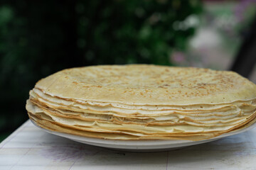 Stack of pancakes on a saucer