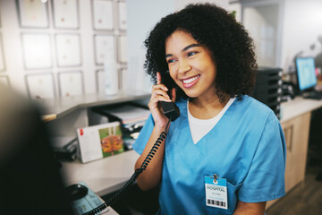 Nurse, phone call and black woman with happiness at doctor office with a smile. Clinic, healthcare...