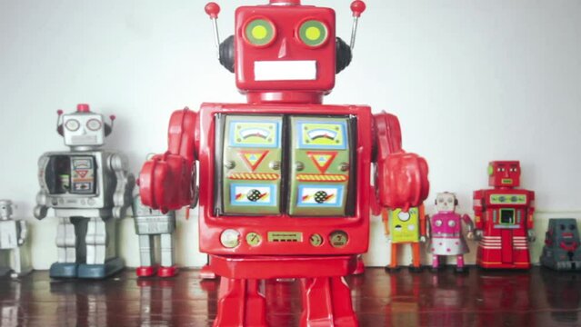 Big vintage robot marching and spinning into at you 