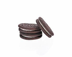 sandwich cookies an isolated with cream on white background