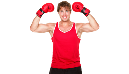 Fitness boxing man showing strength flexing muscles. Handsome strong fit boxer smiling happy wearing red boxing gloves isolated cutout PNG on transparent background.