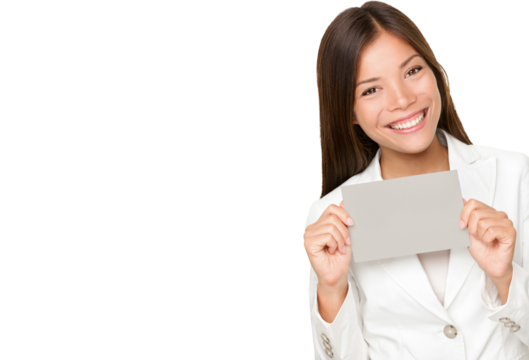Asian woman with a beaming smile holding up a small grey card for your attention and text isolated cutout PNG on transparent background.