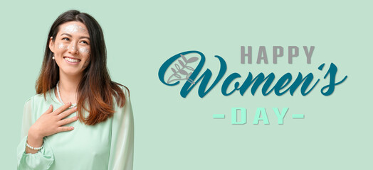 Greeting card for 8 March with beautiful young Asian woman